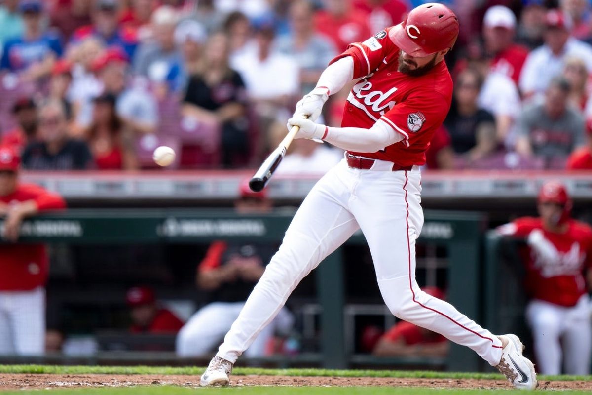 Cincinnati Reds designated hitter Gavin Lux (2) hits a base hit in the sixth inning between Cincinnati Reds and Chicago Cubs at Great American Ball Park in Cincinnati on Sept. 21, 2025.