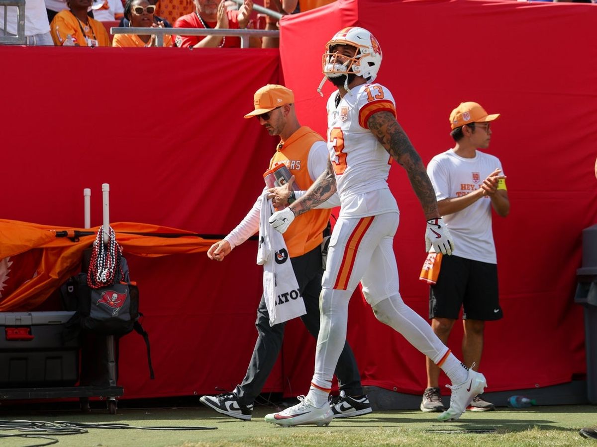 Sep 21, 2025; Tampa, Florida, USA; Tampa Bay Buccaneers wide receiver Mike Evans (13) walks to the locker room against the New York Jets in the fourth quarter at Raymond James Stadium. Mandatory Credit: Nathan Ray Seebeck-Imagn Images