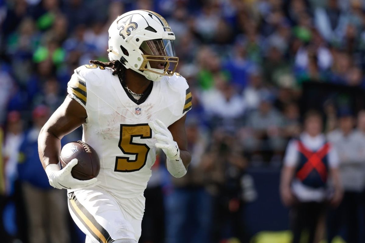 Sep 21, 2025; Seattle, Washington, USA; New Orleans Saints running back Kendre Miller (5) runs the ball during the third quarter against the Seattle Seahawks at Lumen Field. Mandatory Credit: Joe Nicholson-Imagn Images