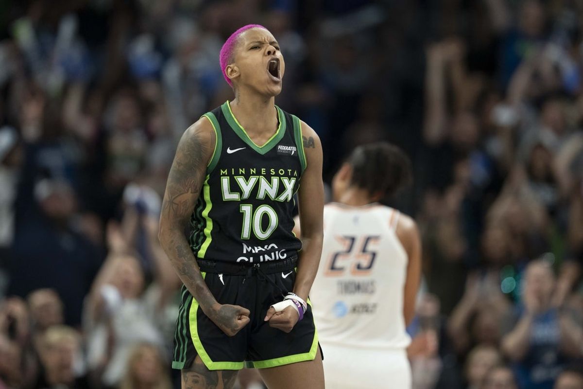 Sep 21, 2025; Minneapolis, Minnesota, USA;  Minnesota Lynx guard Courtney Williams (10) celebrates making a shot against the Phoenix Mercury in the second half during game one of the second round for the 2025 WNBA Playoffs at Target Center. Mandatory Credit: Jesse Johnson-Imagn Images