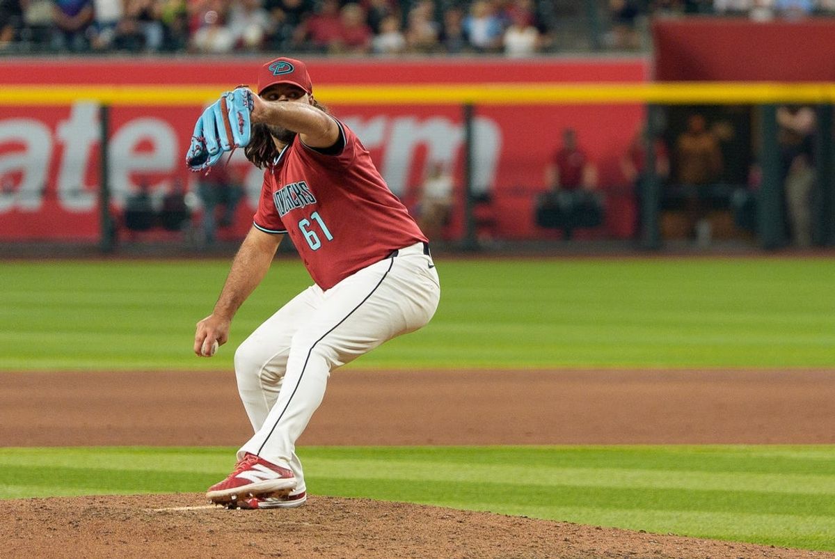 Sep 21, 2025; Phoenix, Arizona, USA; Arizona Diamondbacks pitcher Nabil Crismatt (61) on the mound to pitch in the ninth inning against the Philadelphia Phillies at Chase Field. Mandatory Credit: Allan Henry-Imagn Images