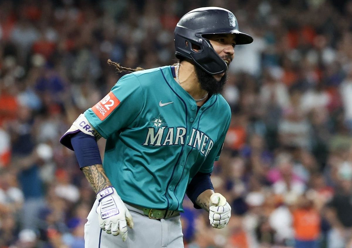 Sep 21, 2025; Houston, Texas, USA;  Seattle Mariners shortstop J.P. Crawford (3) reacts after he hits a grand slam against the Houston Astros in the second inning at Daikin Park. Mandatory Credit: Thomas Shea-Imagn Images
