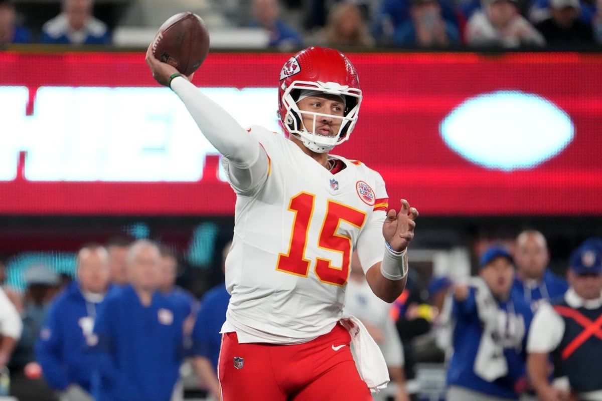 Sep 21, 2025; East Rutherford, New Jersey, USA; Kansas City Chiefs quarterback Patrick Mahomes (15) passes against the New York Giants in the first quarter  at MetLife Stadium. Mandatory Credit: Robert Deutsch-Imagn Images