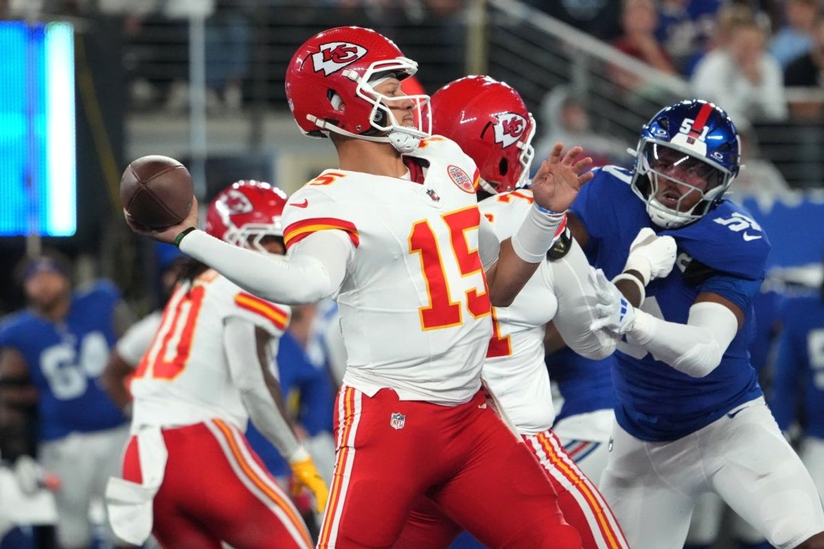Sep 21, 2025; East Rutherford, New Jersey, USA; Kansas City Chiefs quarterback Patrick Mahomes (15) passes against the New York Giants in the first quarter  at MetLife Stadium. Mandatory Credit: Robert Deutsch-Imagn Images