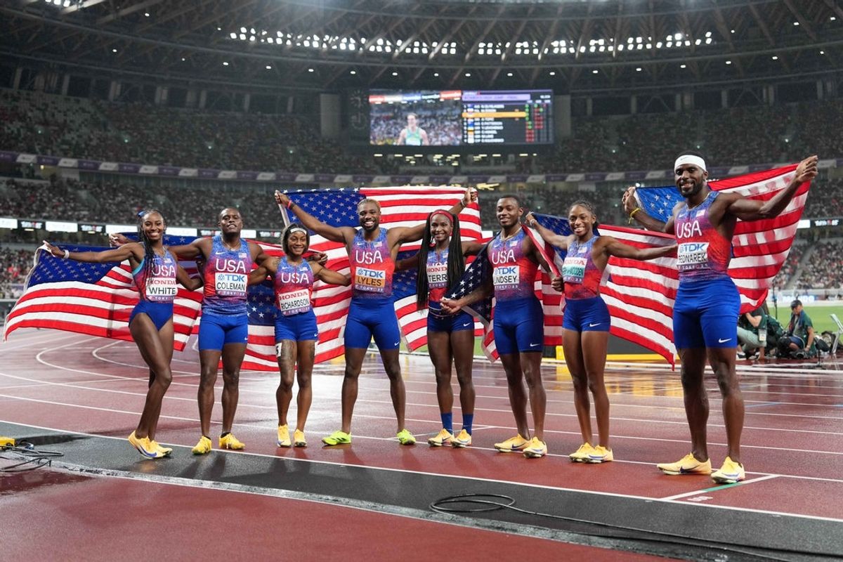 Sep 20, 2025; Tokyo, Japan; Members of the United States men's and women's 4 x 100m relay teams pose with gold medals (from left) Kayla White, Christian Coleman, Sha'Carri Richardson, Noah Lyles, Twanisha Terry, Courtney Lindsey, Melissa Jefferson-Wooden and Kenny Bednarek during the World Athletics Championships at National Stadium. Mandatory Credit: Kirby Lee-Imagn Images