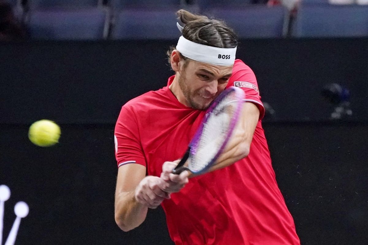 Sep 21, 2025; San Francisco, CA, USA;  Team World player Taylor Fritz returns the ball from Team Europe player Alexander Zverev during the Laver Cup at Chase Center. Mandatory Credit: David Gonzales-Imagn Images