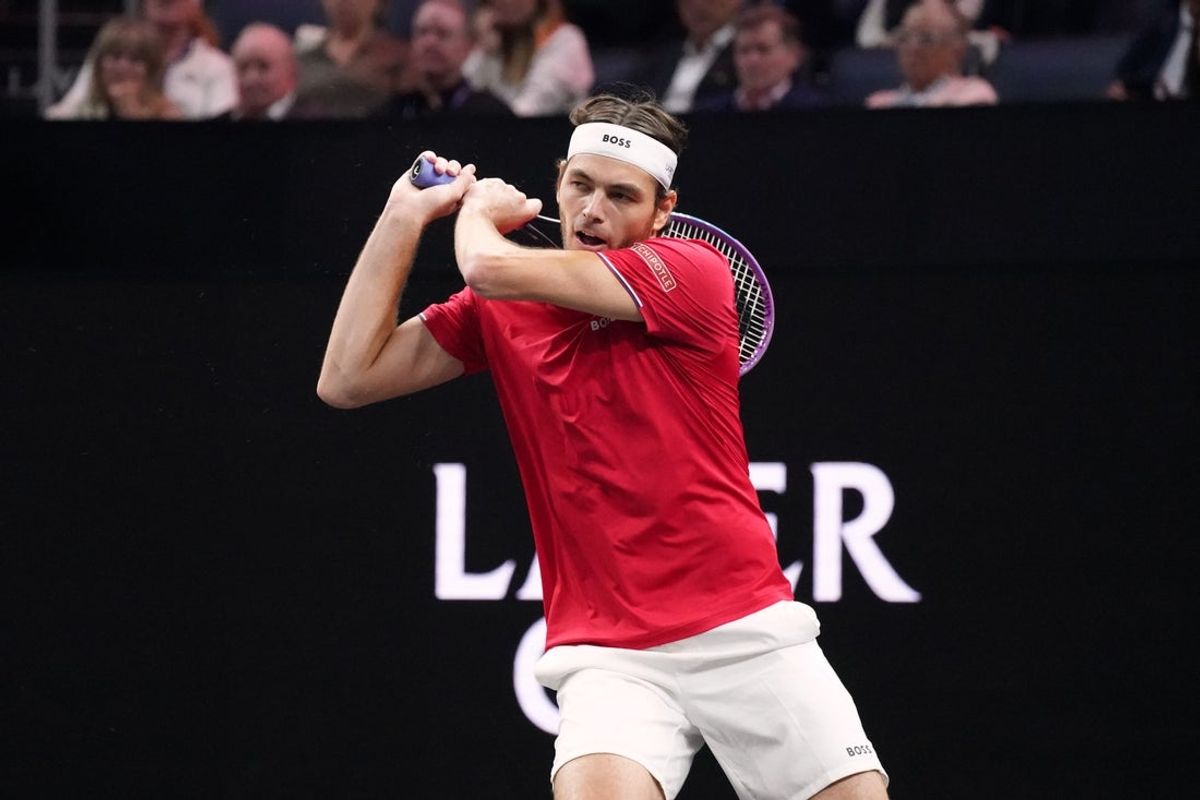Sep 21, 2025; San Francisco, CA, USA;  Team World player Taylor Fritz returns the ball from Team Europe player Alexander Zverev during the Laver Cup at Chase Center. Mandatory Credit: David Gonzales-Imagn Images