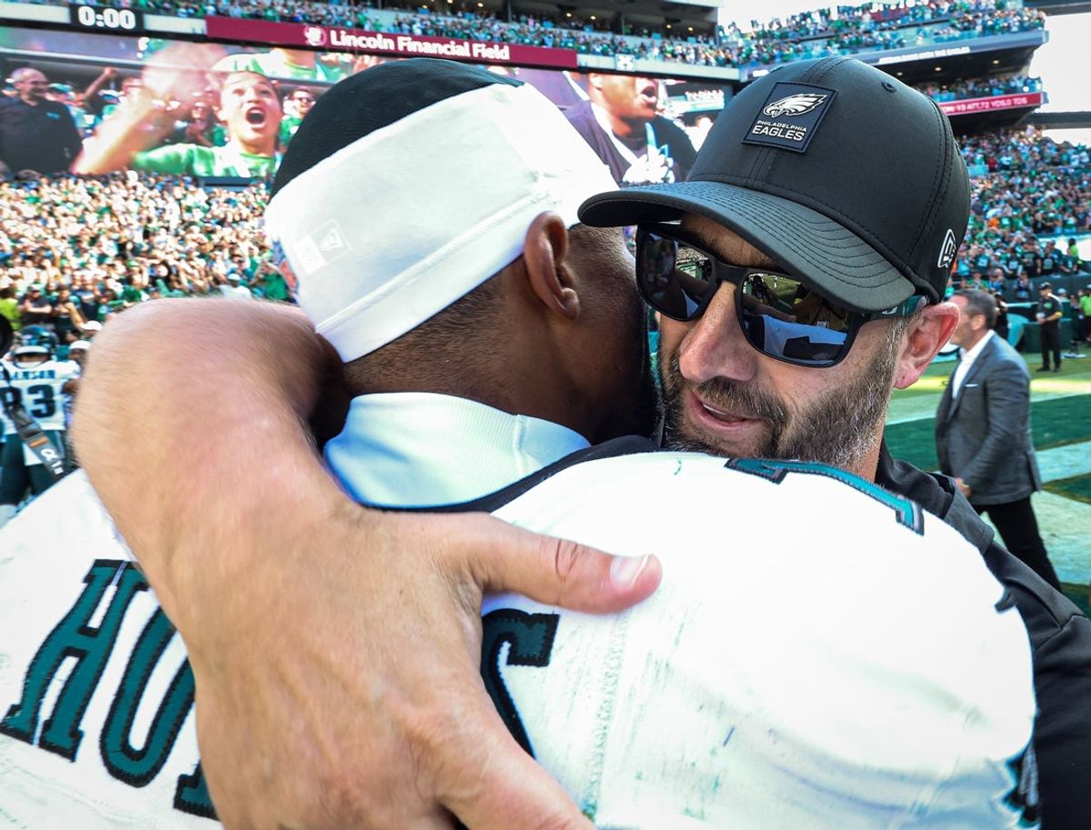 Sep 21, 2025; Philadelphia, Pennsylvania, USA; Philadelphia Eagles quarterback Jalen Hurts (1) and head coach Nick Sirianni hug after a victory against the Los Angeles Rams at Lincoln Financial Field. Mandatory Credit: Bill Streicher-Imagn Images