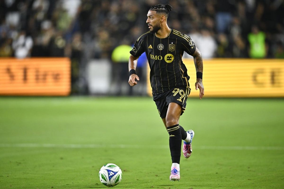 Sep 21, 2025; Los Angeles, California, USA; Los Angeles FC forward Denis Bouanga (99) runs with the ball down the field during the first half against Real Salt Lake at BMO Stadium. Mandatory Credit: Kelvin Kuo-Imagn Images