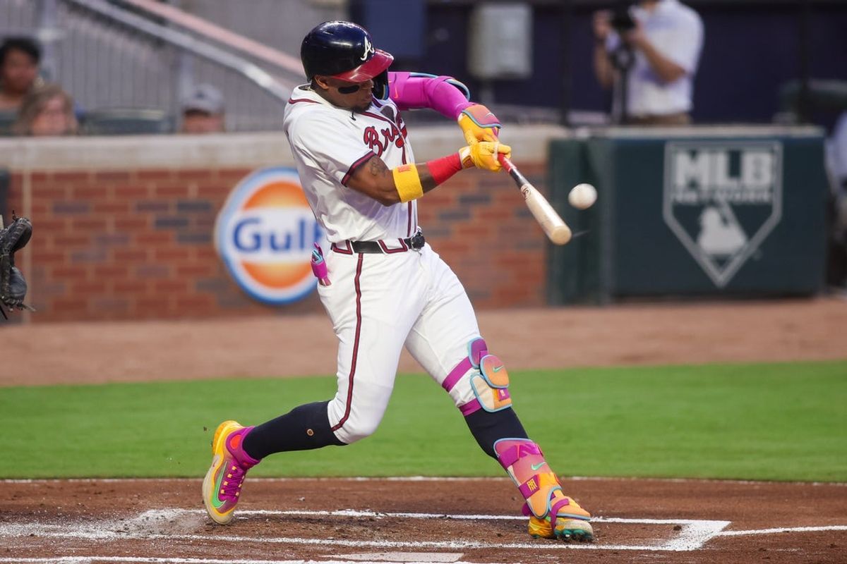 Sep 22, 2025; Atlanta, Georgia, USA; Atlanta Braves right fielder Ronald Acuna Jr. (13) hits a home run against the Washington Nationals in the first inning at Truist Park. Mandatory Credit: Brett Davis-Imagn Images