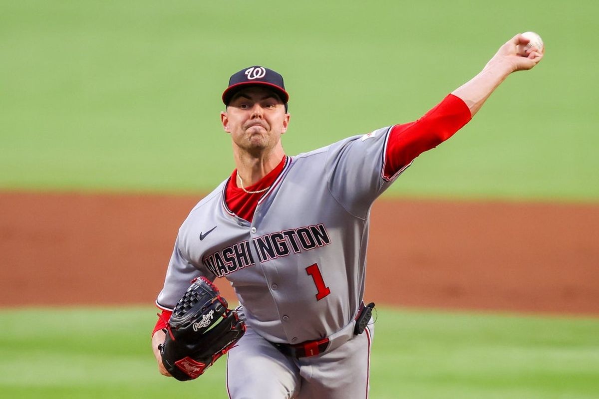 Sep 22, 2025; Atlanta, Georgia, USA; Washington Nationals starting pitcher MacKenzie Gore (1) throws against the Atlanta Braves in the first inning at Truist Park. Mandatory Credit: Brett Davis-Imagn Images