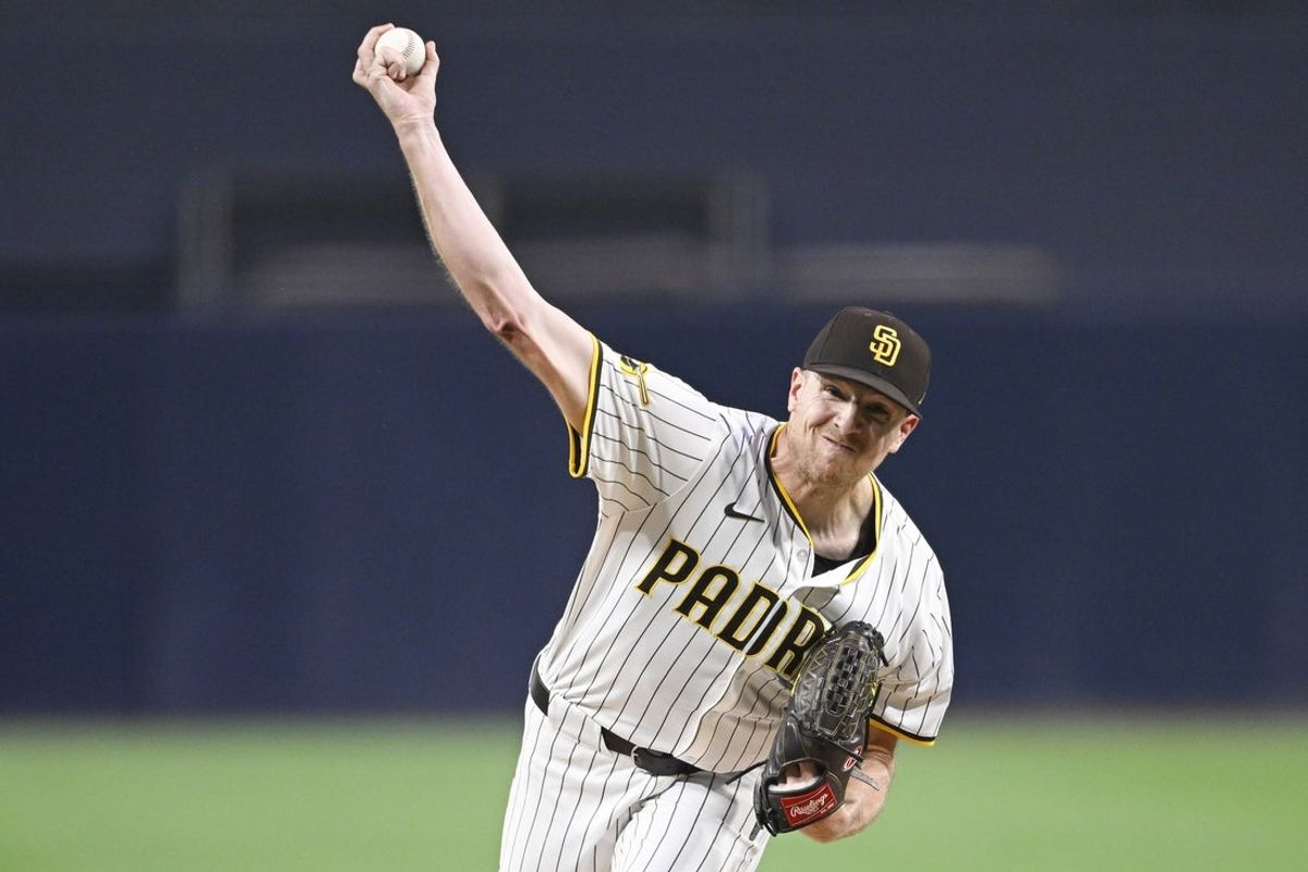 Sep 22, 2025; San Diego, California, USA; San Diego Padres starting pitcher Nick Pivetta (27) delivers during the first inning against the Milwaukee Brewers at Petco Park. Mandatory Credit: Denis Poroy-Imagn Images