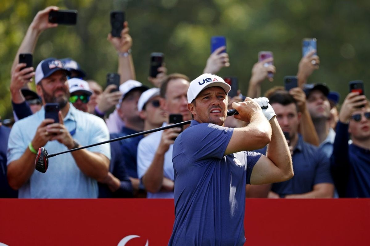 Sep 23, 2025; Bethpage, New York, USA; Bryson DeChambeau plays his shot from the 12th tee during a practice round of the Ryder Cup golf tournament at Bethpage Black. Mandatory Credit: Peter Casey-Imagn Images