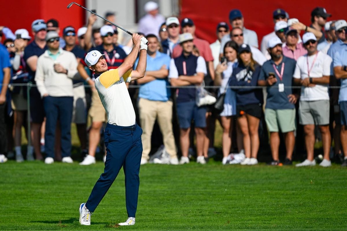 Sep 26, 2025; Bethpage, New York, USA; Justin Rose hits off the fairway on the first hole of the practice round on the first day of competition for the Ryder Cup at Bethpage Black. Mandatory Credit: Dennis Schneidler-Imagn Images