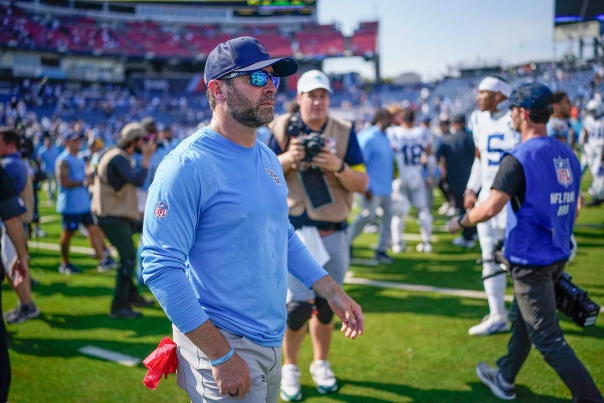 Tennessee Titans coach Brian Callahan exits the field after the game against the Indianapolis Colts at Nissan Stadium in Nashville, Tenn., Sunday, Sept. 21, 2025.