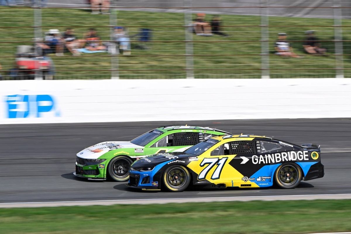 Sep 21, 2025; Loudon, New Hampshire, USA; NASCAR Cup Series driver Michael McDowell (71) races driver Noah Gragson (4) in the Mobil 1 301 at New Hampshire Motor Speedway. Mandatory Credit: Eric Canha-Imagn Images