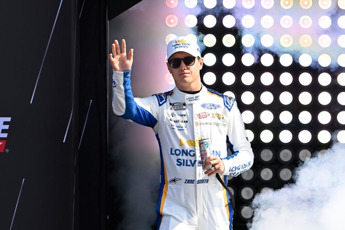 Sep 21, 2025; Loudon, New Hampshire, USA; NASCAR Cup Series driver Zane Smith (38) is introduced before the start of the Mobil 1 301 at New Hampshire Motor Speedway. Mandatory Credit: Eric Canha-Imagn Images
