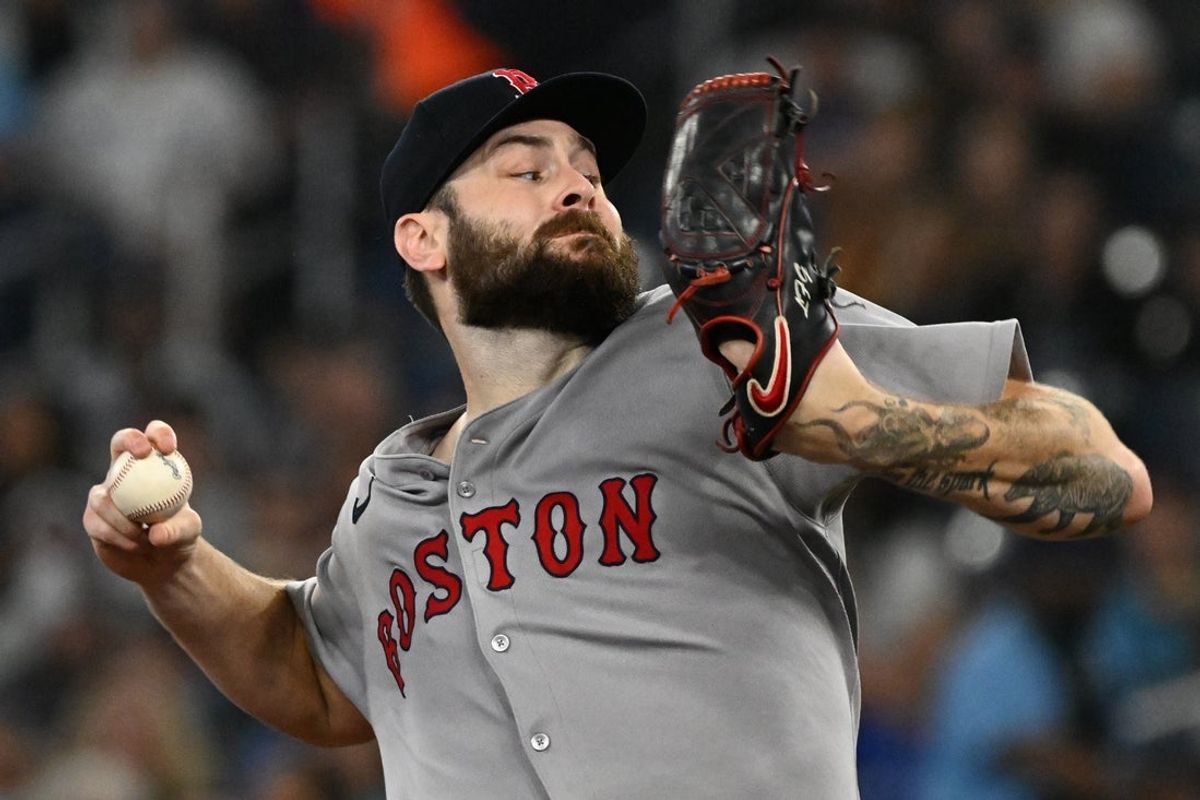 Sep 23, 2025; Toronto, Ontario, CAN;   Boston Red Sox starting pitcher Lucas Giolito (54) delivers a pitch against the Toronto Blue Jays in the first inning at Rogers Centre. Mandatory Credit: Dan Hamilton-Imagn Images
