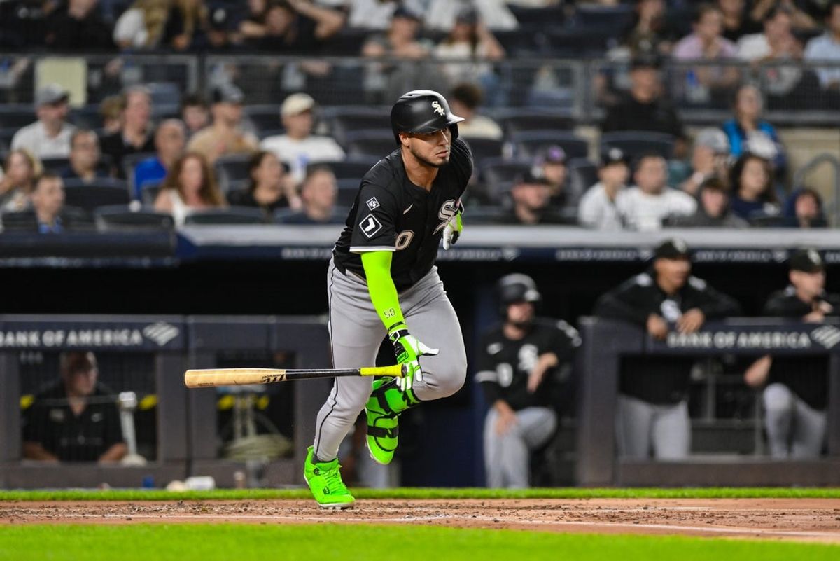 Sep 23, 2025; Bronx, New York, USA; Chicago White Sox second baseman Lenyn Sosa (50) hits a single against the New York Yankees during the second inning at Yankee Stadium. Mandatory Credit: John Jones-Imagn Images