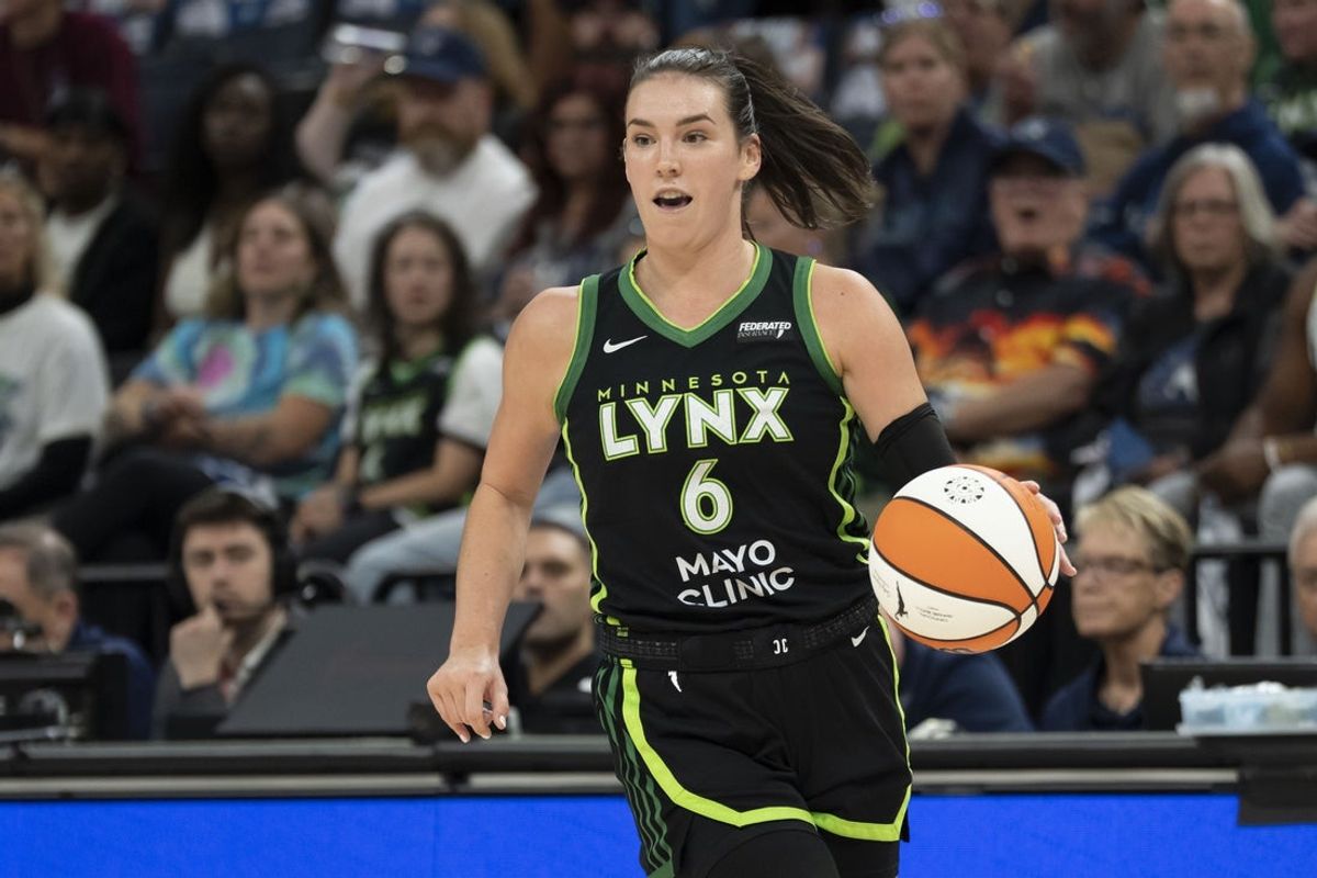 Sep 23, 2025; Minneapolis, Minnesota, USA; Minnesota Lynx forward Bridget Carleton (6) dribbles against the Phoenix Mercury in the first half during game two of the second round for the 2025 WNBA Playoffs at Target Center. Mandatory Credit: Jesse Johnson-Imagn Images