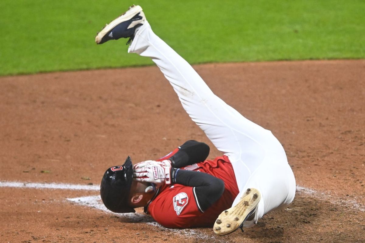 Sep 23, 2025; Cleveland, Ohio, USA; Cleveland Guardians designated hitter David Fry (6) reacts after he was hit in the face with a foul ball in the sixth inning against the Detroit Tigers at Progressive Field. Mandatory Credit: David Richard-Imagn Images