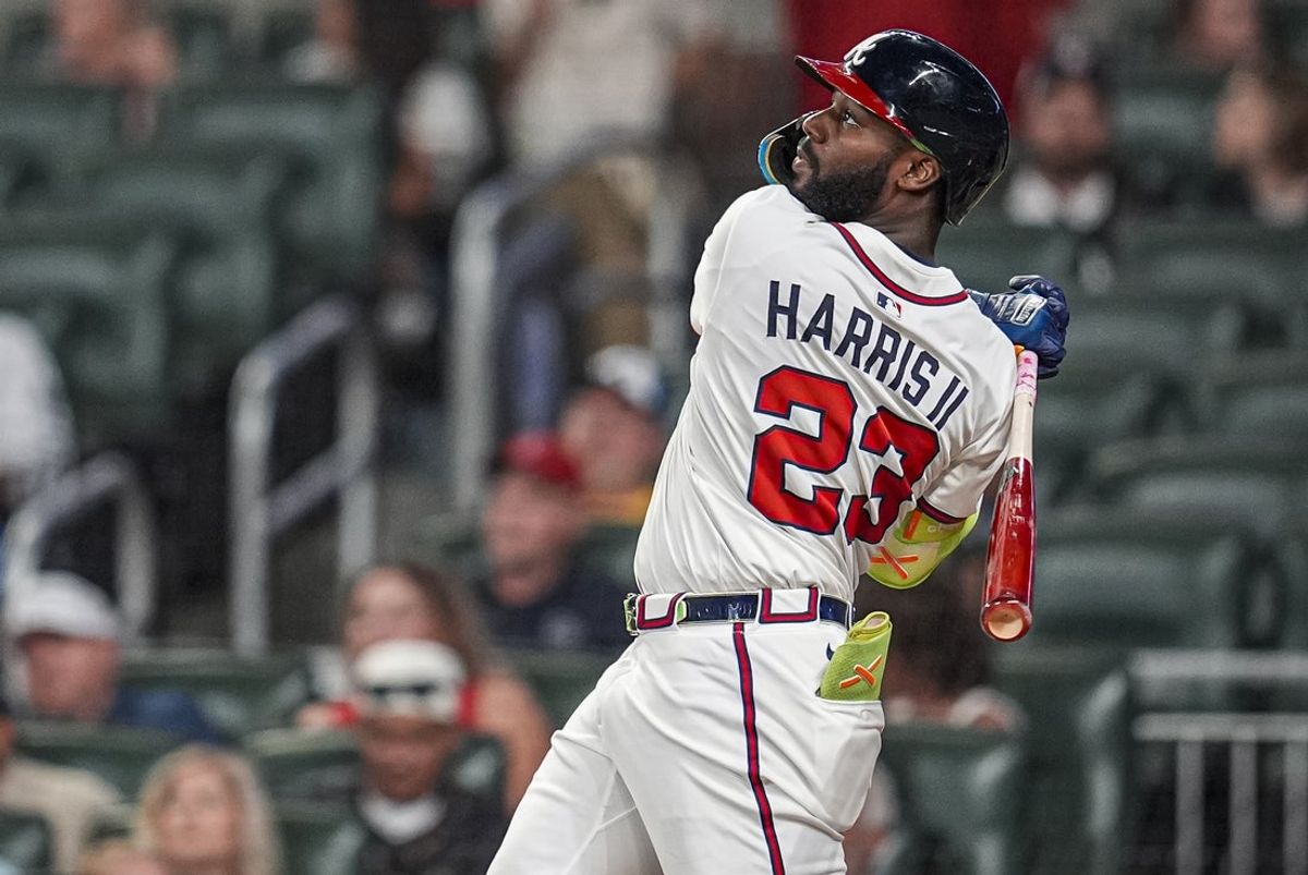 Sep 23, 2025; Cumberland, Georgia, USA; Atlanta Braves center fielder Michael Harris II (23) hits a home run against the Washington Nationals during the seventh inning at Truist Park. Mandatory Credit: Dale Zanine-Imagn Images
