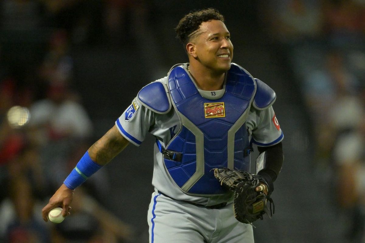 Sep 23, 2025; Anaheim, California, USA;  Kansas City Royals catcher Salvador Perez (13) smiles after catching a pop foul during the third inning against the Los Angeles Angels at Angel Stadium. Mandatory Credit: Jayne Kamin-Oncea-Imagn Images