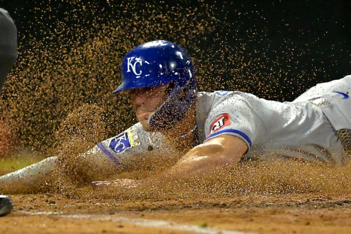 Sep 23, 2025; Anaheim, California, USA;  Kansas City Royals right fielder Randal Grichuk (15) scores on a double by second baseman Adam Frazier (26) during the seventh inning against the Los Angeles Angels at Angel Stadium. Mandatory Credit: Jayne Kamin-Oncea-Imagn Images