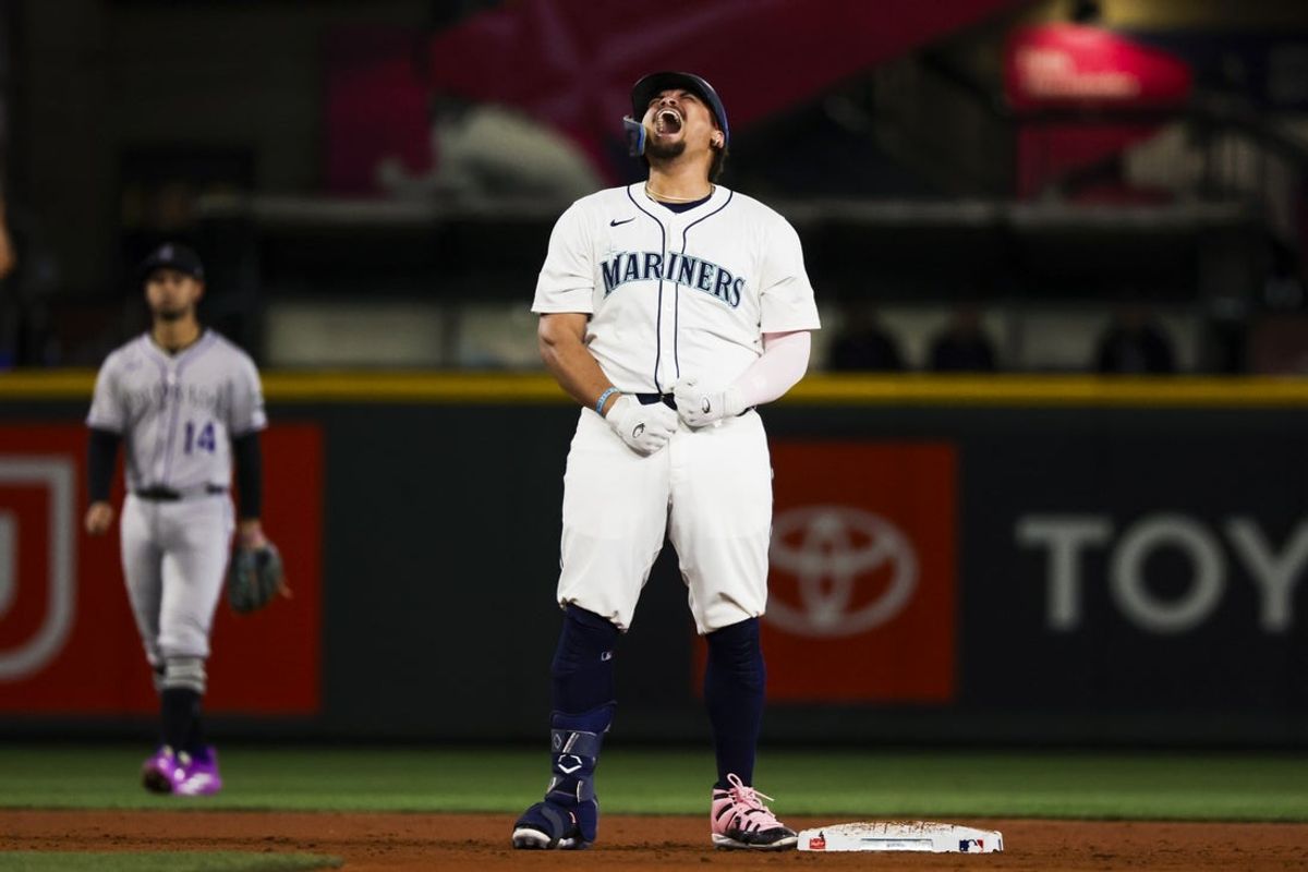 Sep 23, 2025; Seattle, Washington, USA; Seattle Mariners first baseman Josh Naylor (12) reacts after hitting a three-run double against the Colorado Rockies during the eighth inning at T-Mobile Park. Mandatory Credit: Joe Nicholson-Imagn Images