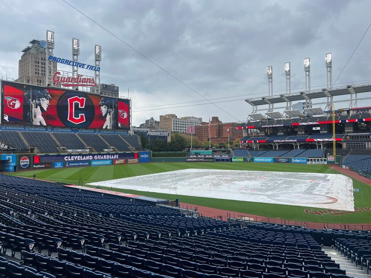 Progressive Field, home of the Cleveland Guardians, with a tarp on the field during the afternoon on Wednesday, Sept. 24, 2025, in Cleveland, Ohio.