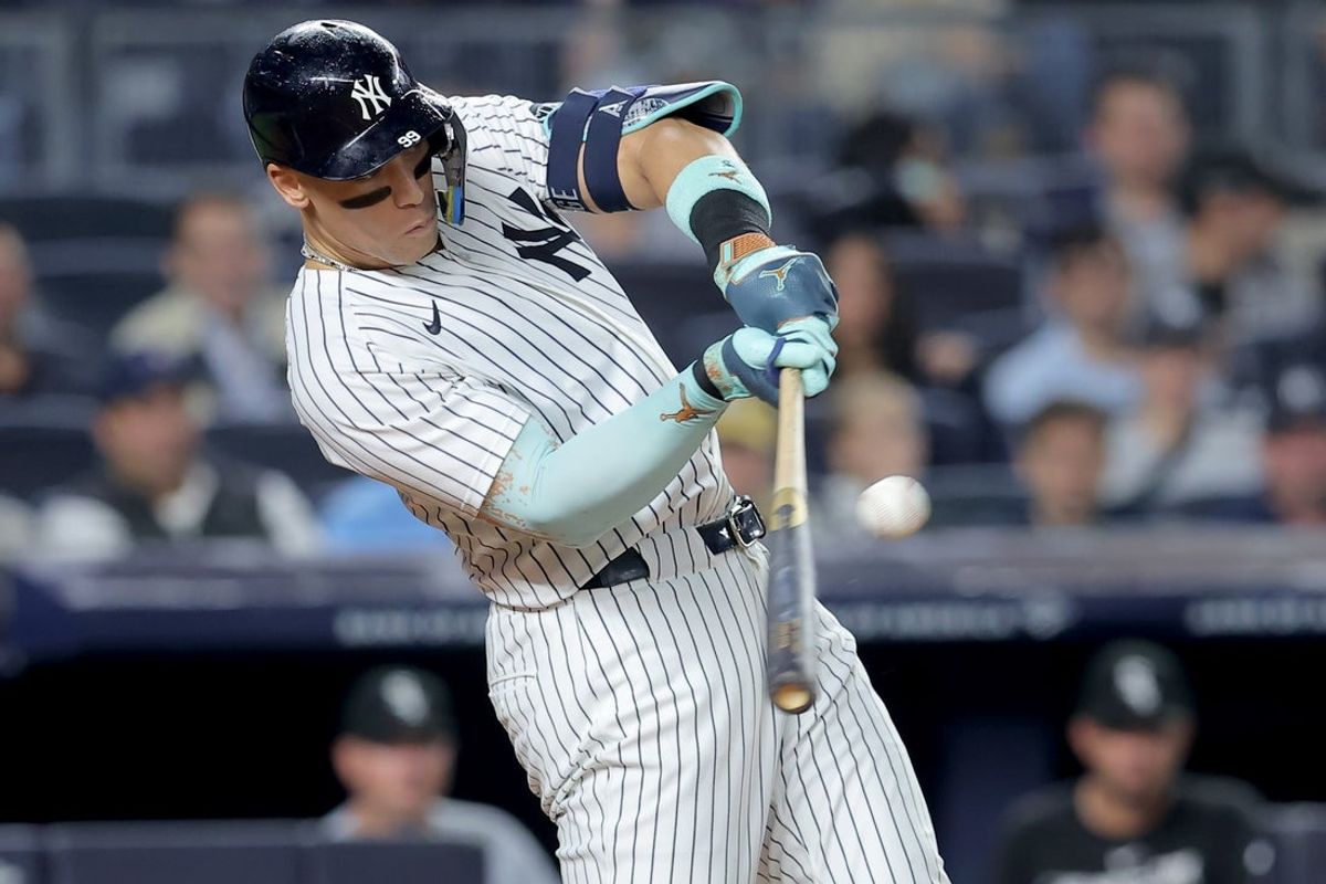 Sep 24, 2025; Bronx, New York, USA; New York Yankees right fielder Aaron Judge (99) hits a three run home run against the Chicago White Sox during the second inning at Yankee Stadium. Mandatory Credit: Brad Penner-Imagn Images