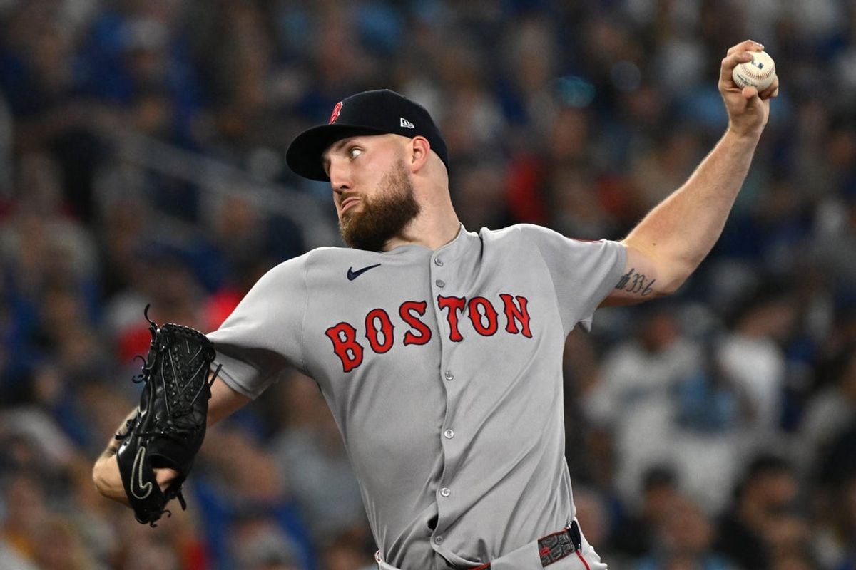 Sep 24, 2025; Toronto, Ontario, CAN;  Boston Red Sox starting pitcher Garrett Crochet (35) delivers a pitch against the Toronto Blue Jays in the fourth inning at Rogers Centre. Mandatory Credit: Dan Hamilton-Imagn Images
