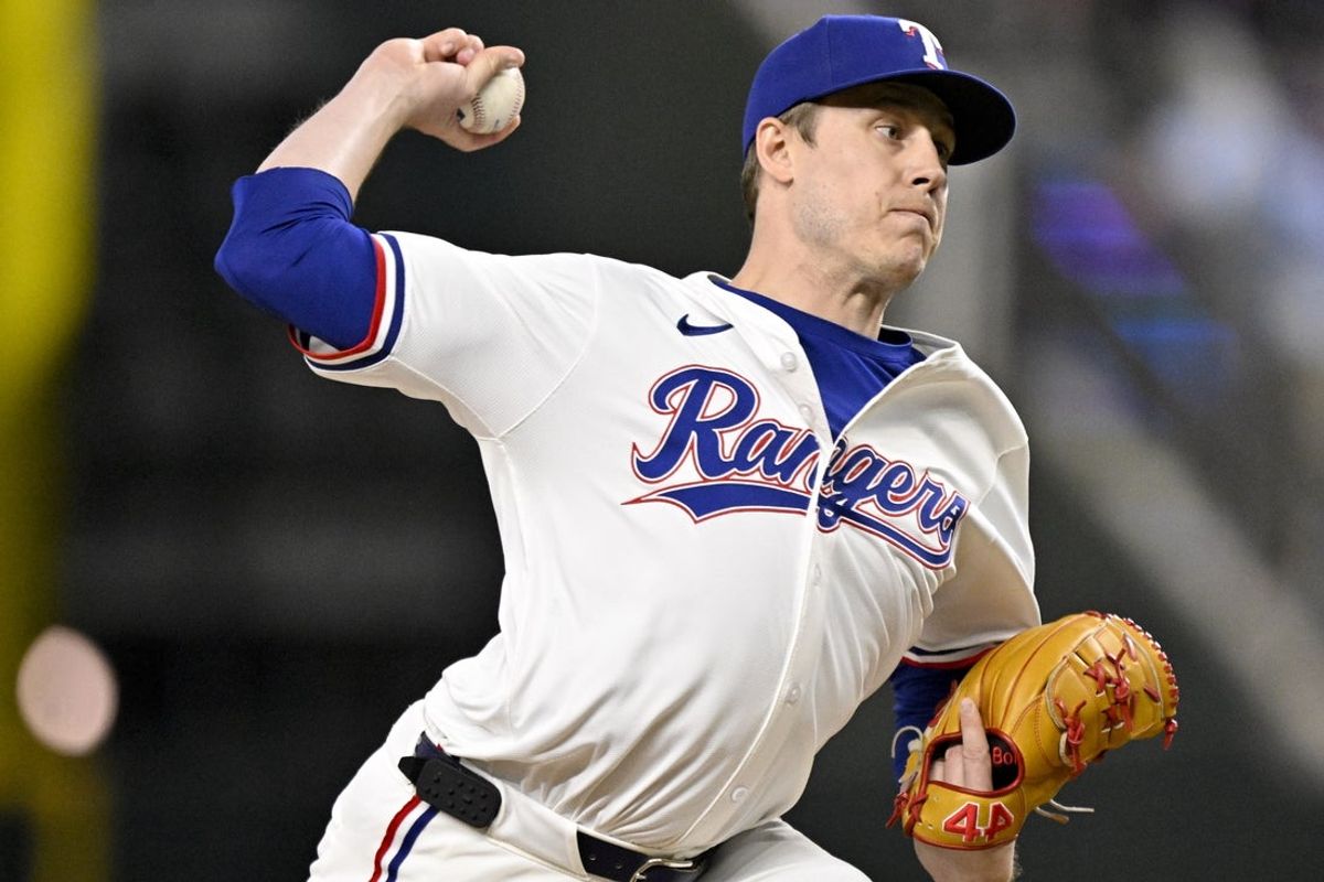 Sep 24, 2025; Arlington, Texas, USA; Texas Rangers relief pitcher Phil Maton (88) pitches against the Minnesota Twins during the ninth inning at Globe Life Field. Mandatory Credit: Jerome Miron-Imagn Images