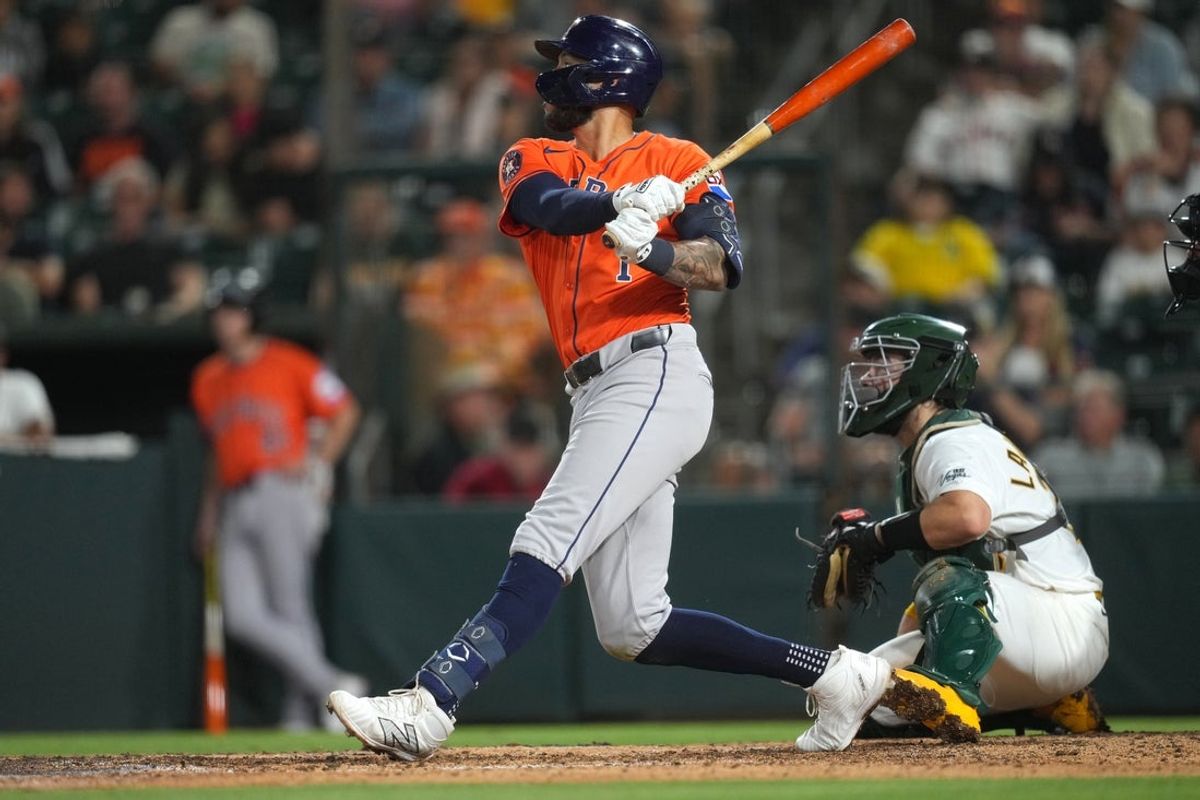 Sep 24, 2025; West Sacramento, California, USA; Houston Astros shortstop Carlos Correa (1) hits a double against the Athletics in the ninth inning at Sutter Health Park. Mandatory Credit: Cary Edmondson-Imagn Images