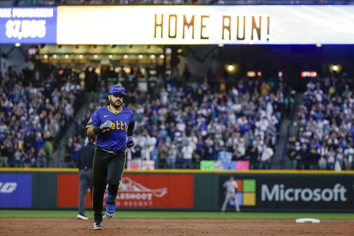 Sep 25, 2025; Seattle, Washington, USA; Seattle Mariners third baseman Eugenio Suarez (28) runs the bases after hitting a two-run home run against the Colorado Rockies during the second inning at T-Mobile Park. Mandatory Credit: Joe Nicholson-Imagn Images