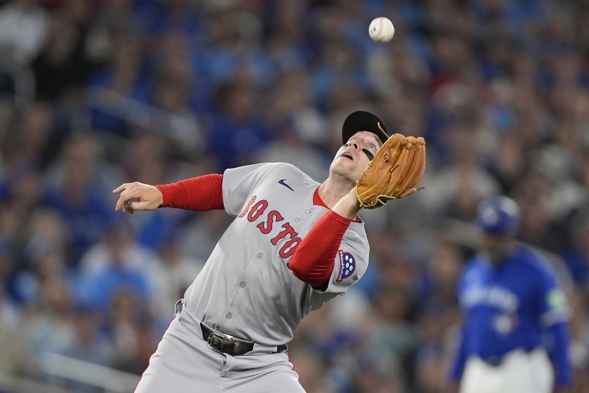 Sep 25, 2025; Toronto, Ontario, CAN; Boston Red Sox third baseman Alex Bregman (2) catches a fly ball hit Toronto Blue Jays center fielder Daulton Varsho (not pictured) during the second inning at Rogers Centre. Mandatory Credit: John E. Sokolowski-Imagn Images