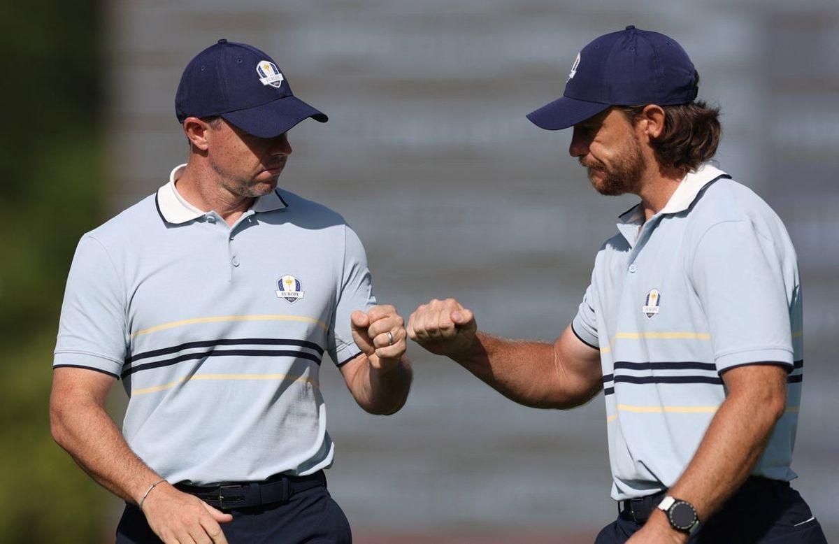 [US, Mexico & Canada customers only] Sep 26, 2025; Bethpage, New York, USA; Team Europe golfers Rory McIlroy and Tommy Fleetwood react on the eleventh hole on the first day of competition for the Ryder Cup at Bethpage Black. Mandatory Credit: Paul Childs-Reuters via Imagn Images