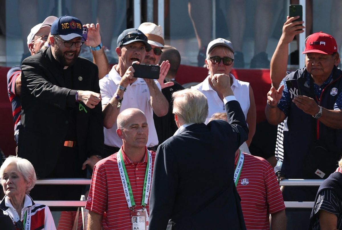 [US, Mexico & Canada customers only] Sep 26, 2025; Bethpage, New York, USA; U.S. President Donald Trump gestures to fans in the stands on the first hole ahead of the four-balls on the first day of competition for the Ryder Cup at Bethpage Black. Mandatory Credit: Paul Childs-Reuters via Imagn Images