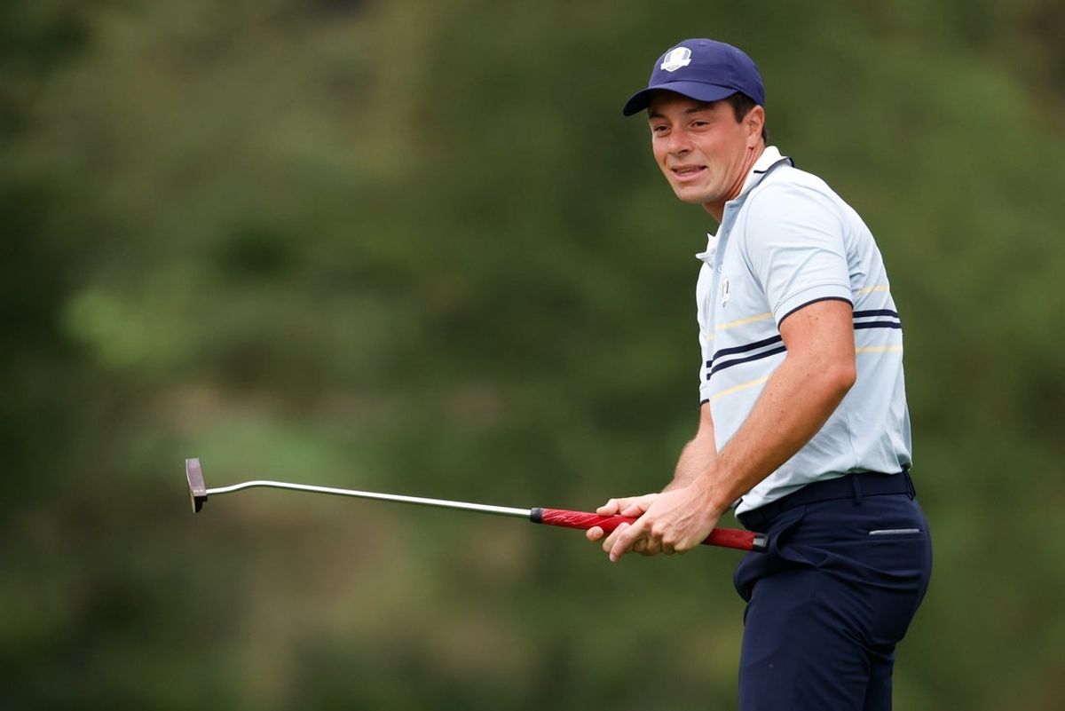 Sep 26, 2025; Bethpage, New York, USA; Team Europe golfer Viktor Hovland reacts to his putt on the second green on the first day of competition for the Ryder Cup at Bethpage Black. Mandatory Credit: Peter Casey-Imagn Images