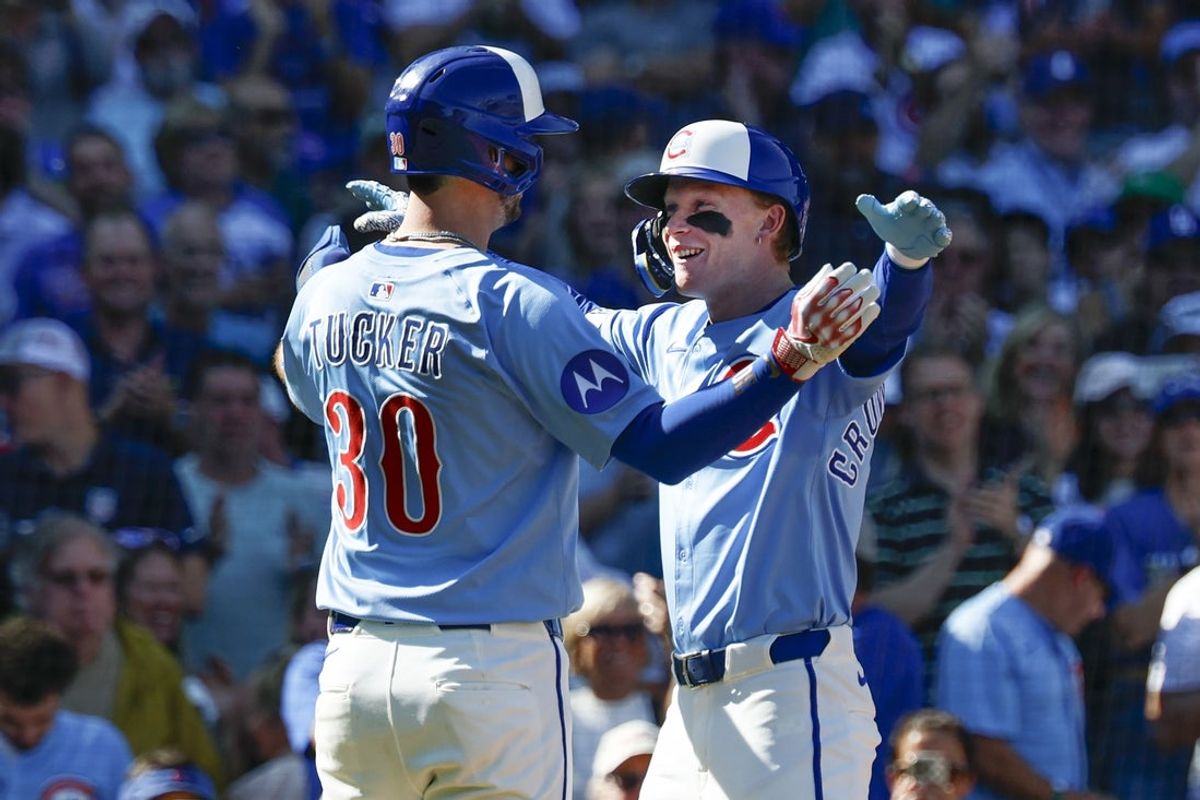Sep 26, 2025; Chicago, Illinois, USA; Chicago Cubs center fielder Pete Crow-Armstrong (4) celebrates with Kyle Tucker (30) after hitting a two-run home run against the St. Louis Cardinals during the fourth inning at Wrigley Field. Mandatory Credit: Kamil Krzaczynski-Imagn Images
