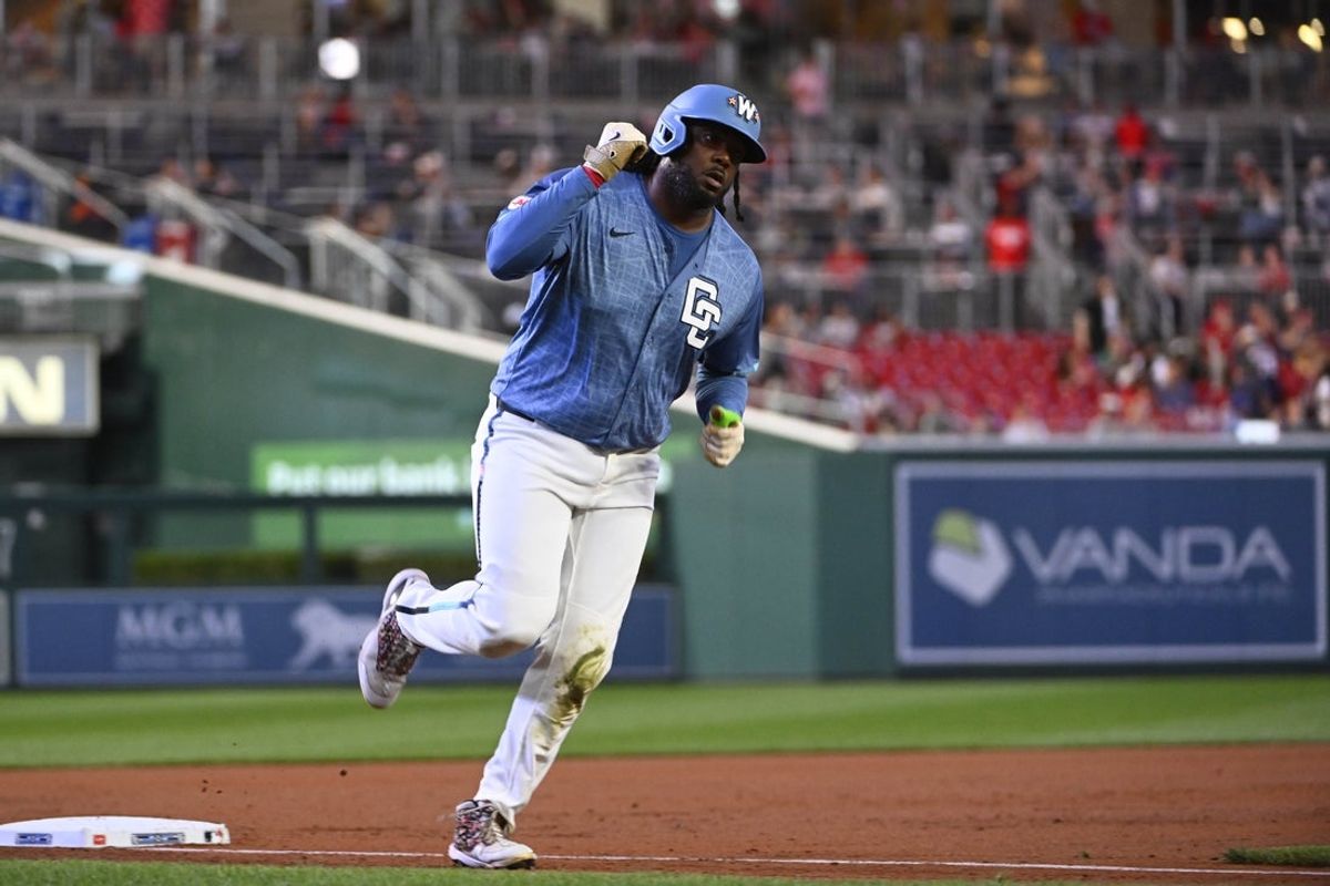 Sep 26, 2025; Washington, District of Columbia, USA; Washington Nationals first baseman Josh Bell (19) reacts after hitting a solo home run against the Chicago White Sox during the first inning at Nationals Park. Mandatory Credit: Brad Mills-Imagn Images