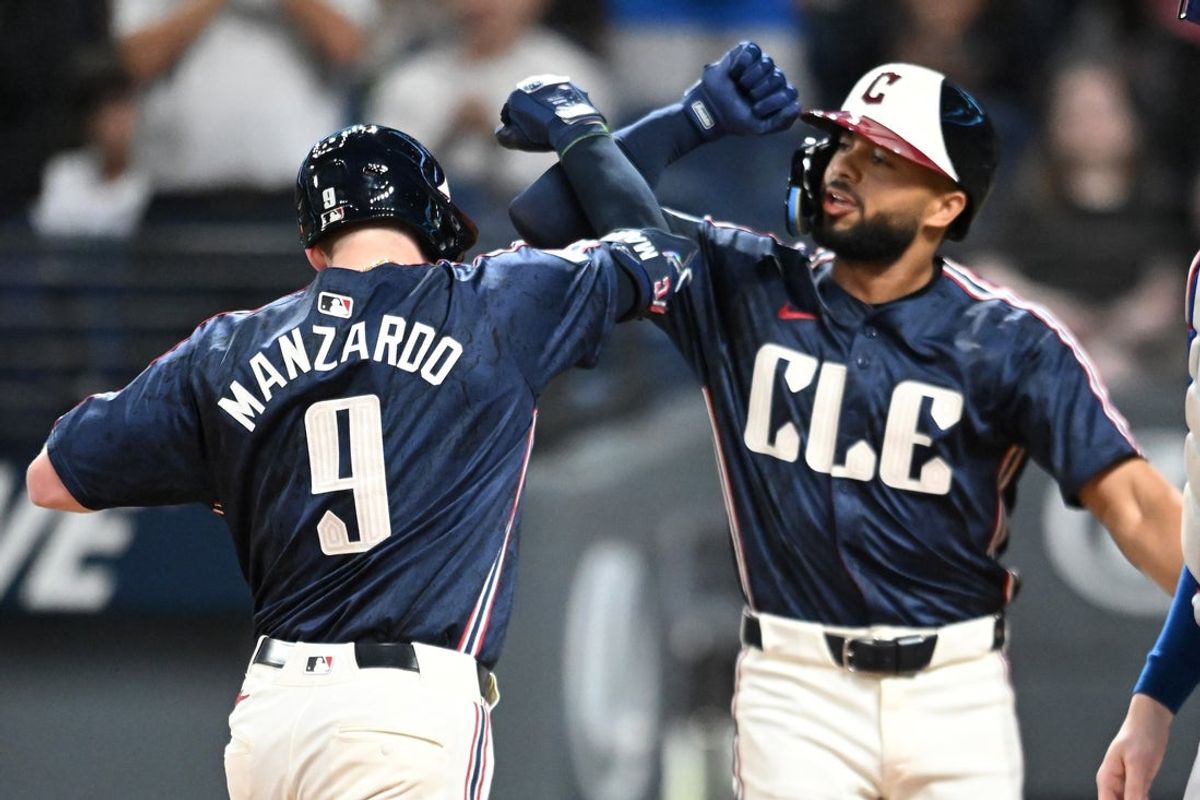 Sep 26, 2025; Cleveland, Ohio, USA; Cleveland Guardians designated hitter Kyle Manzardo (9) celebrates with right fielder George Valera (35) after hitting a home run against the Texas Rangers during the first inning at Progressive Field. Mandatory Credit: Ken Blaze-Imagn Images