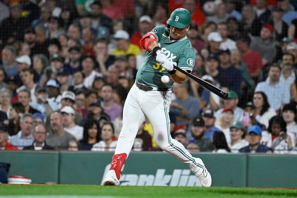 Sep 26, 2025; Boston, Massachusetts, USA; Boston Red Sox first baseman Nathaniel Lowe (37) hits a double against the Detroit Tigers during the second inning at Fenway Park. Mandatory Credit: Eric Canha-Imagn Images