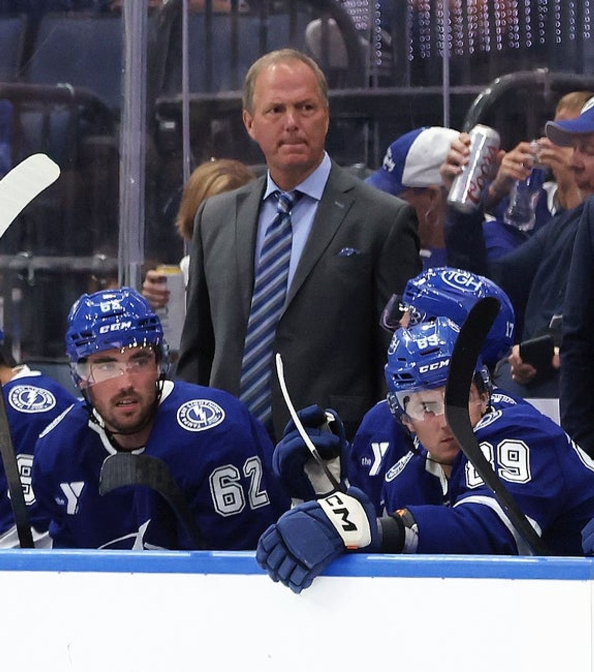 Sep 26, 2025; Tampa, Florida, USA; Tampa Bay Lightning head coach Jon Cooper looks on against the Carolina Hurricanes during the second period at Benchmark International Arena. Mandatory Credit: Kim Klement Neitzel-Imagn Images
