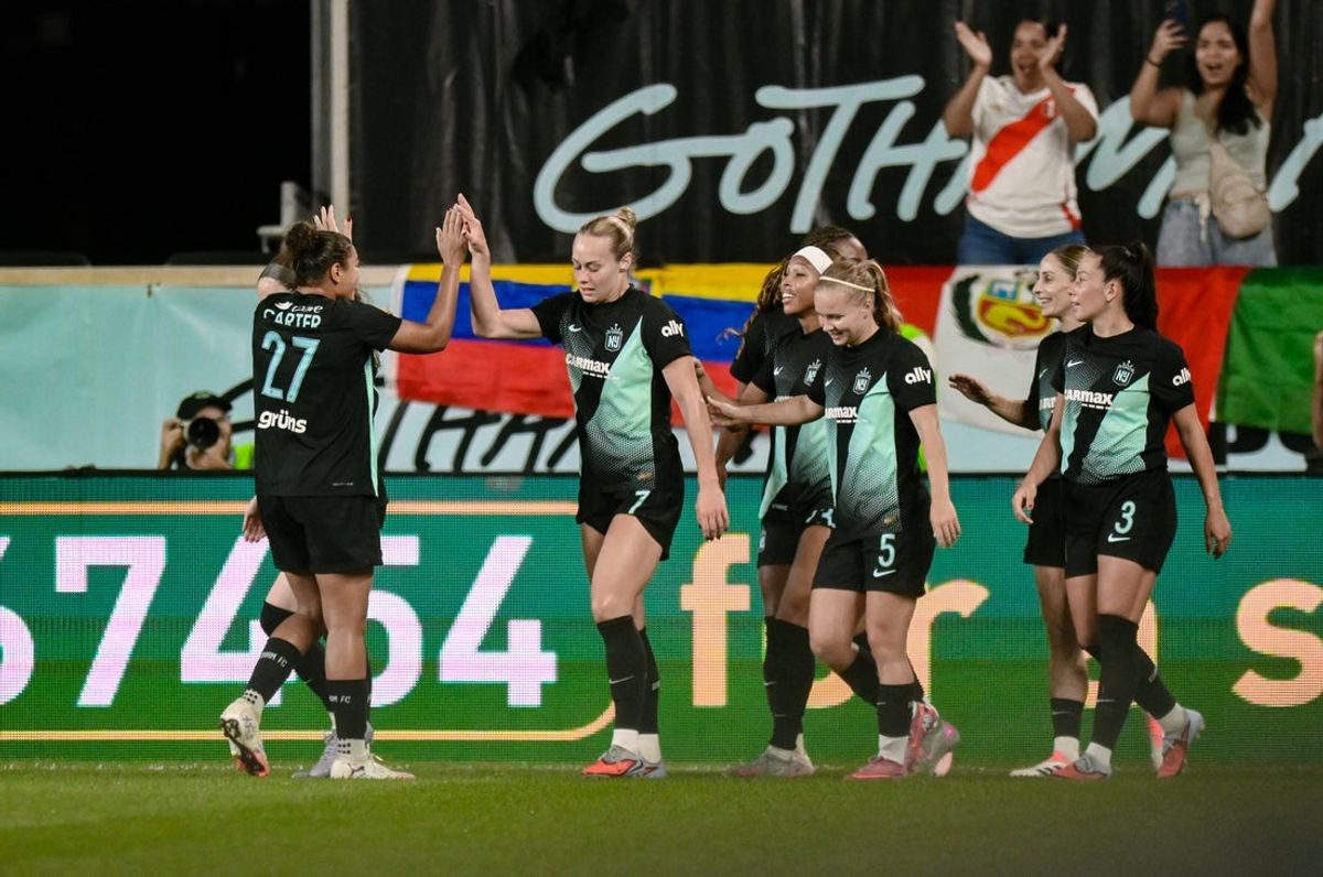 Sep 26, 2025; Harrison, New Jersey, USA; NJ/NY Gotham FC forward Midge Purce (23) celebrates with teammates after scoring a goal against the Portland Thorns FC during the first half at Sports Illustrated Stadium. Mandatory Credit: John Jones-Imagn Images
