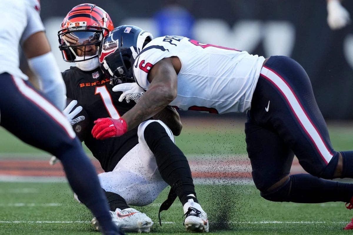 Houston Texans linebacker Denzel Perryman (6) is penalized for unnecessary roughness after hitting Cincinnati Bengals wide receiver Ja'Marr Chase (1) in the fourth quarter of a Week 10 NFL football game between the Houston Texans and the Cincinnati Bengals, Sunday, Nov. 12, 2023, at Paycor Stadium in Cincinnati. The Houston Texans won, 30-27.