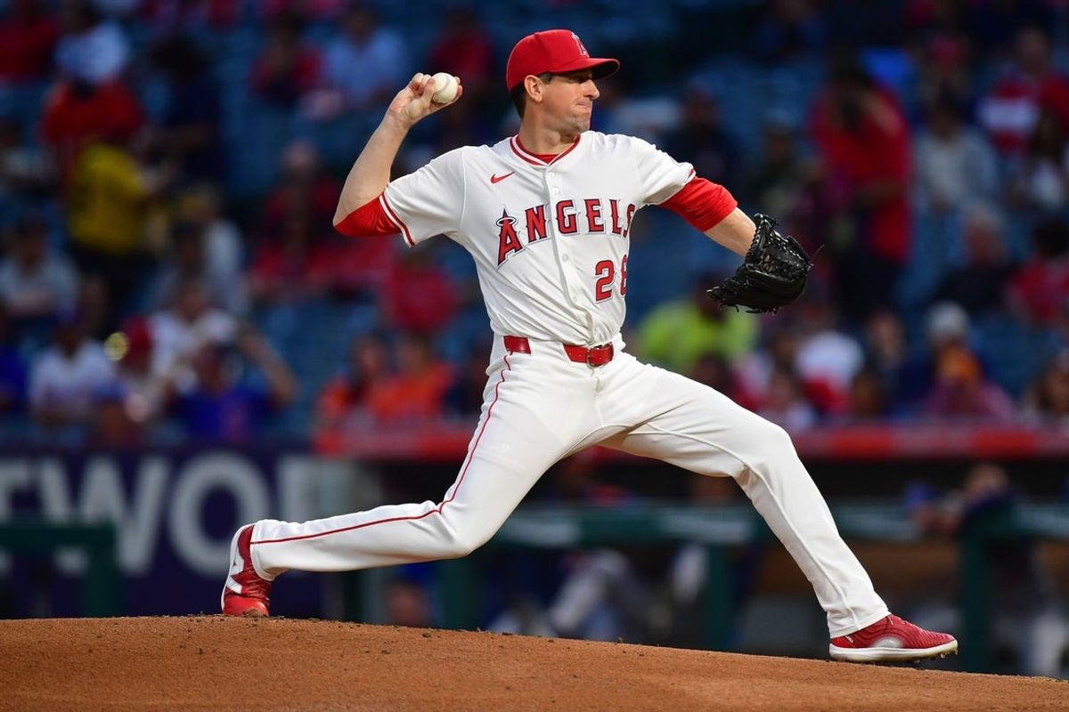 Sep 26, 2025; Anaheim, California, USA; Los Angeles Angels pitcher Kyle Hendricks (28) throws against the Houston Astros during the first inning at Angel Stadium. Mandatory Credit: Gary A. Vasquez-Imagn Images