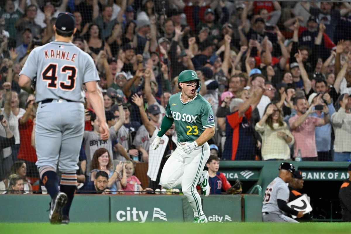 Sep 26, 2025; Boston, Massachusetts, USA; Boston Red Sox second baseman Romy Gonzalez (23) runs home to score the game winning run against the Detroit Tigers during the ninth inning at Fenway Park. Mandatory Credit: Eric Canha-Imagn Images
