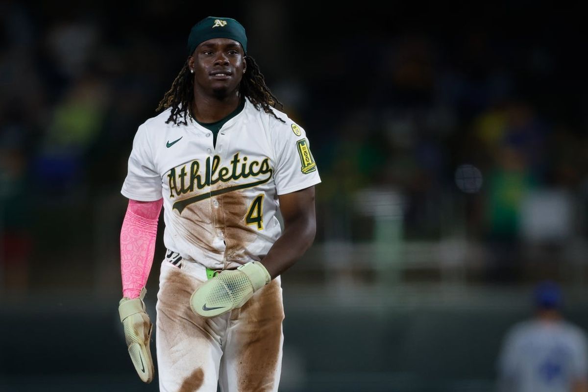 Sep 26, 2025; West Sacramento, California, USA; Athletics center fielder Lawrence Butler (4) reacts after stealing second base during the second inning against the Kansas City Royals at Sutter Health Park. Mandatory Credit: Sergio Estrada-Imagn Images