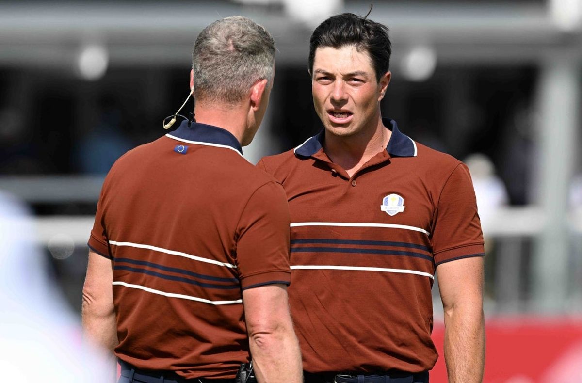 Sep 27, 2025; Bethpage, New York, USA; Team Europe captain Luke Donald congratulates golfer Viktor Hovland after winning a match on the penultimate day of competition for the Ryder Cup at Bethpage Black. Mandatory Credit: Dennis Schneidler-Imagn Images